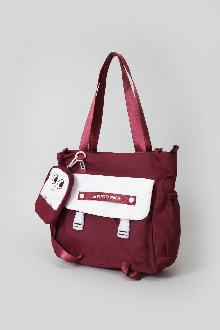 A burgundy and white tote bag with a matching small pouch featuring a cartoon face, displayed on a solid white background.